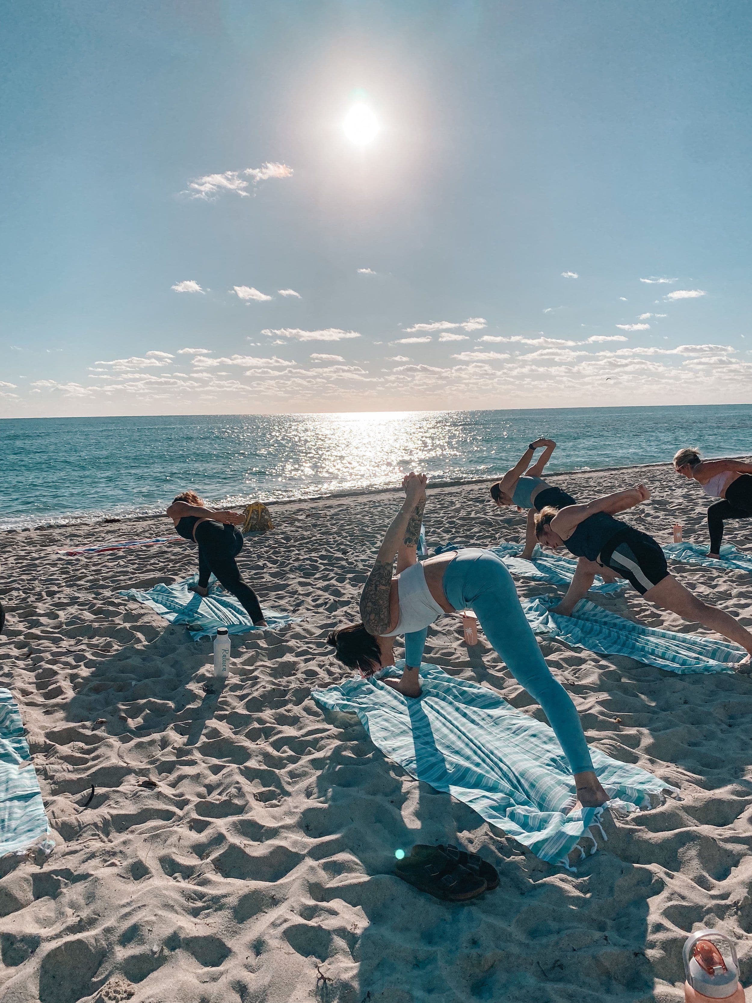 Yoga class on the beach